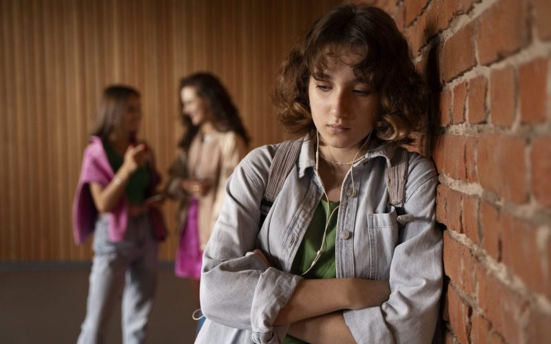 front-view-sad-girl-being-bullied-by-girls